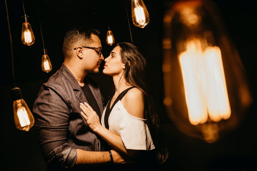 asian man holding white woman for how to get a second date with her